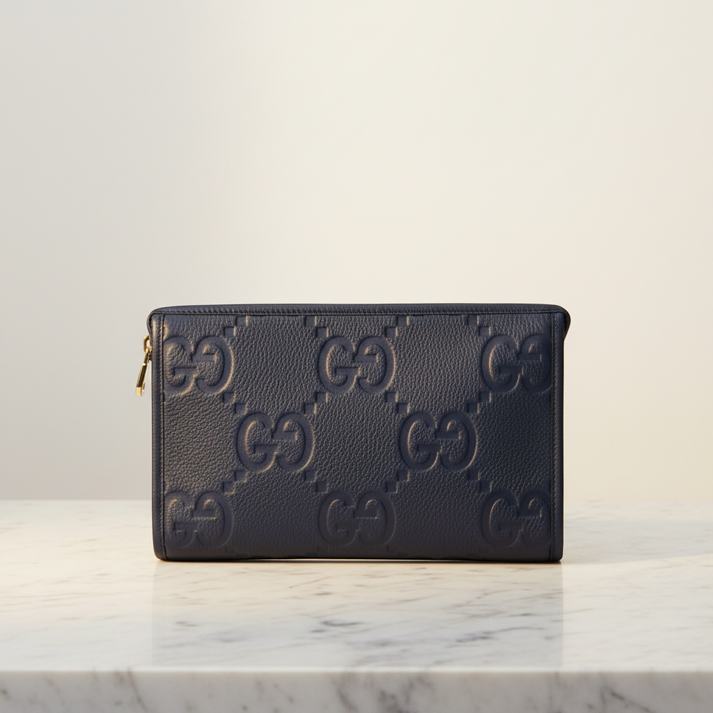 Gucci Jumbo GG · Leather Clutch